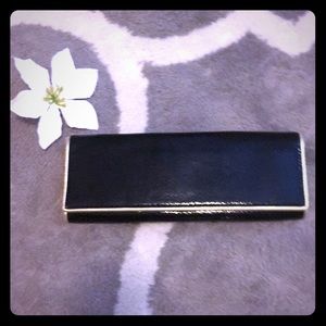 Black snakeskin clutch